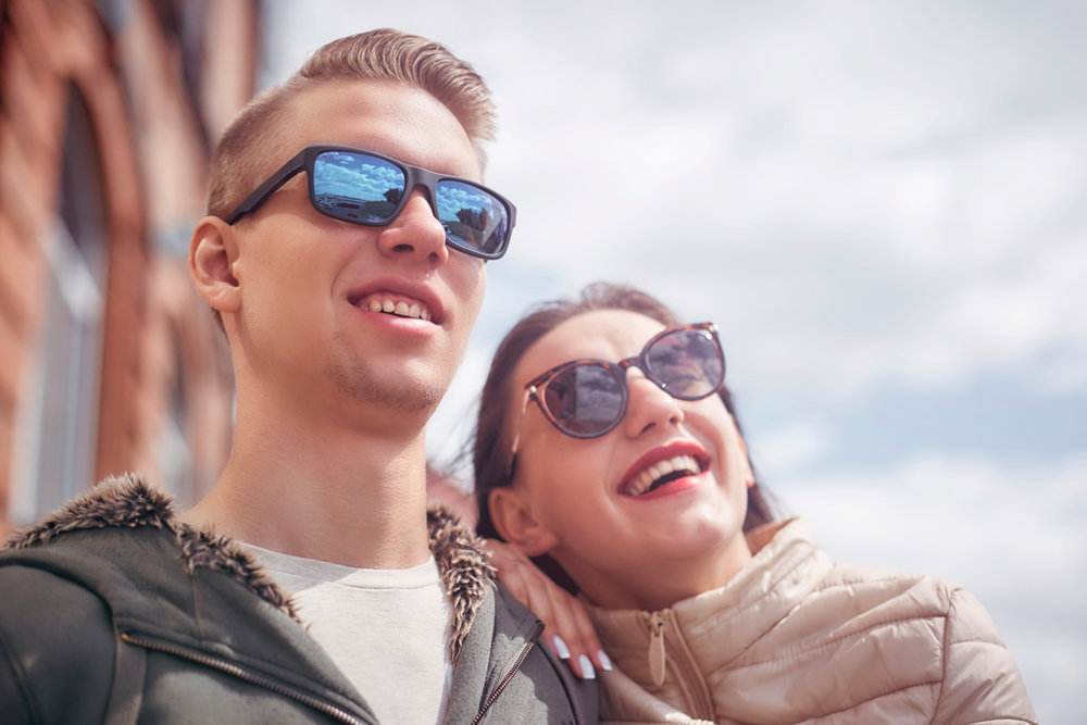 Happy Couple Sharing Music - Optometrist Palm Springs